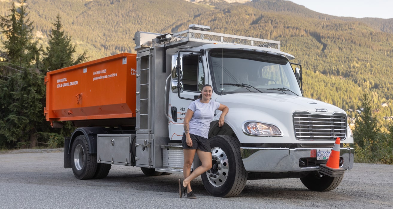 Holiday lights on modern house in winter after snowfall